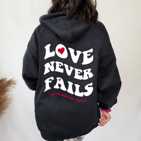 Love Never Fails Aesthetic Oversized Hoodie for Valentine positive Trendy Quotes Christian pullovers heart graphic wamer tops